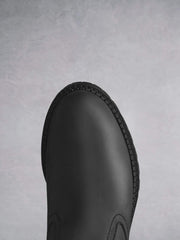 Asham Black Leather - Glossy black leather boots with tread sole.