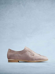Mullion, our stylish lace-up brogue shoe, cut from rose gold leather.