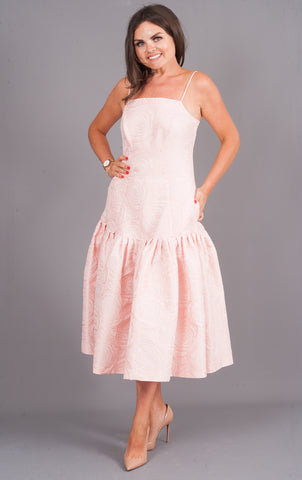 https://walkinwardrobeonline.com/products/pink-rose-drop-hem-peplum-dress?variant=13896609923133