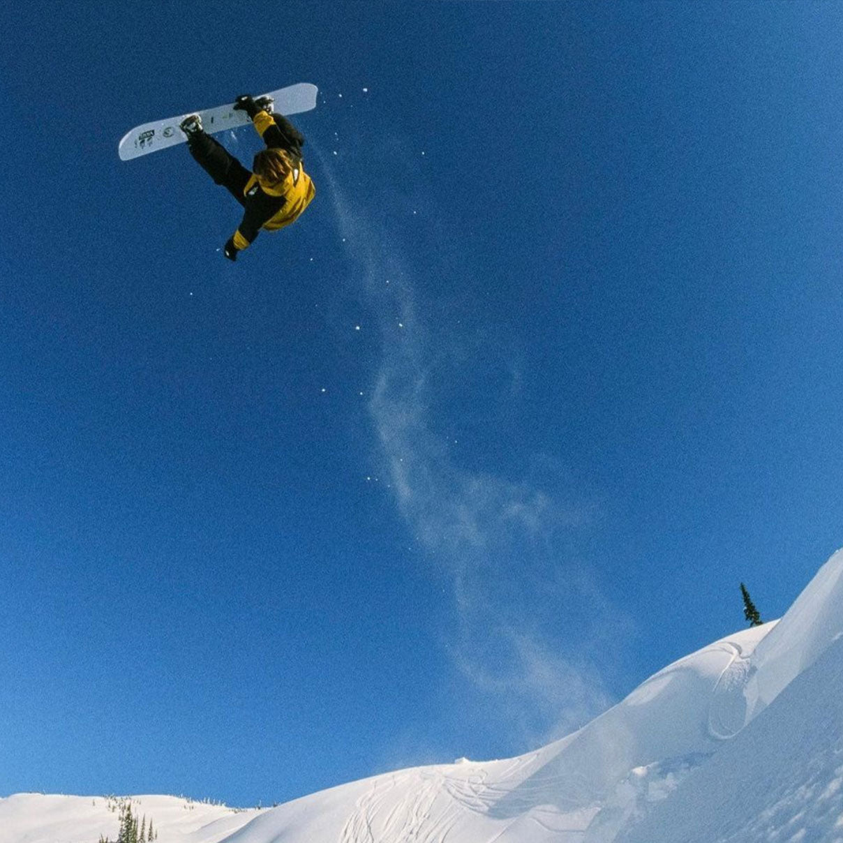 Blake Paul flipping high up in the air on his snowboard