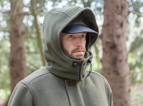 WeatherWool All Around Jacket in Solid Drab Color with Double Hood Up and worn over a Ball Cap