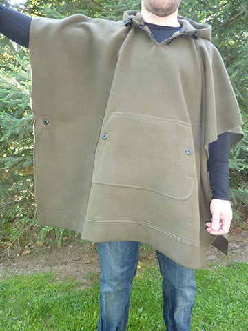 WeatherWool Poncho in Solid Drab Color with Arm Extended to show width of Poncho