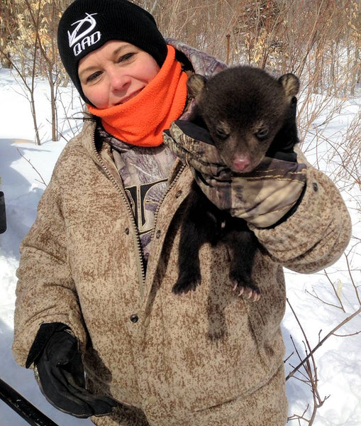 Twyla Jean wore her WeatherWool SkiJacket while doing Black Bear Research with the Biologists from the State of Maine