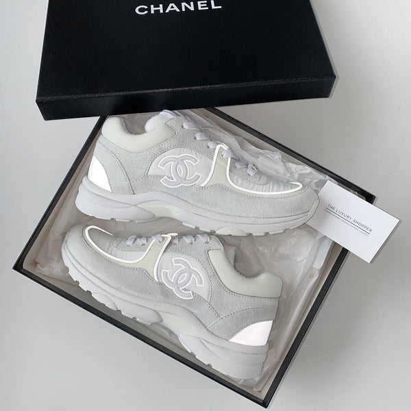 black and white chanel trainers