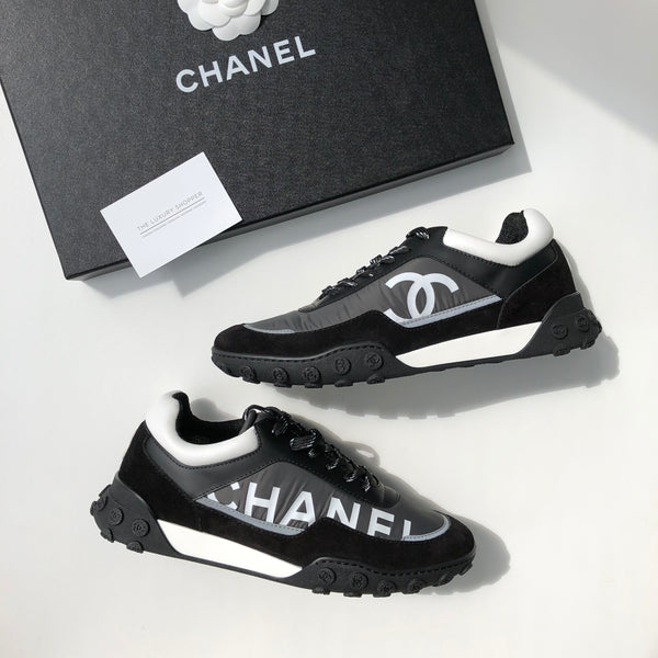 chanel logo trainers