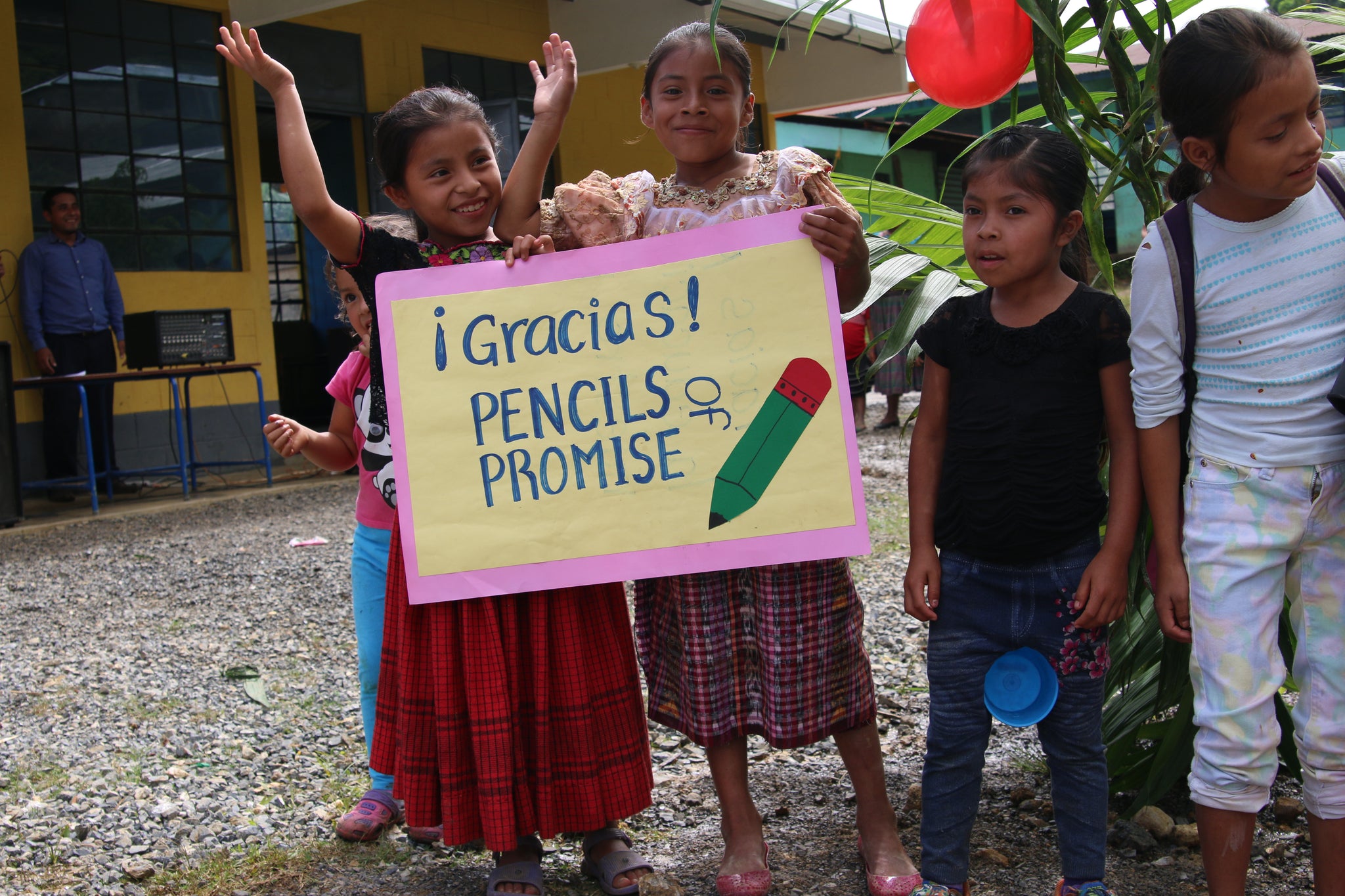 Students made signs to thank Pencils of Promise