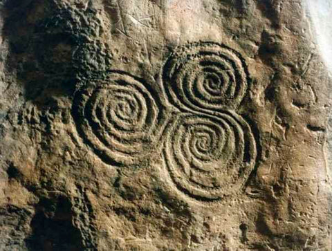 ic: Triple-spiral in passage at Newgrange.