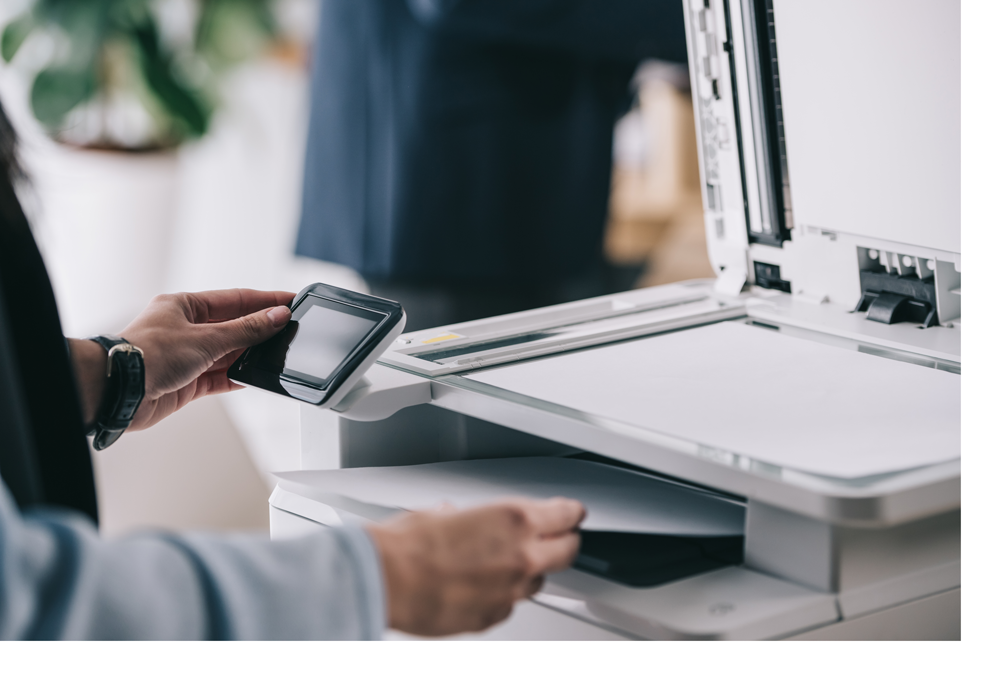 Woman printing at office - MPS blog