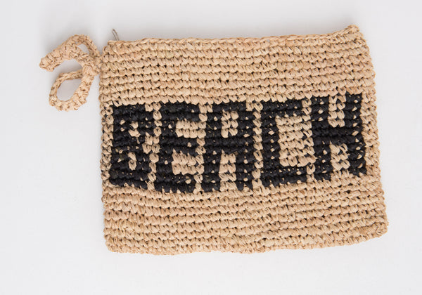 woven straw clutch bag