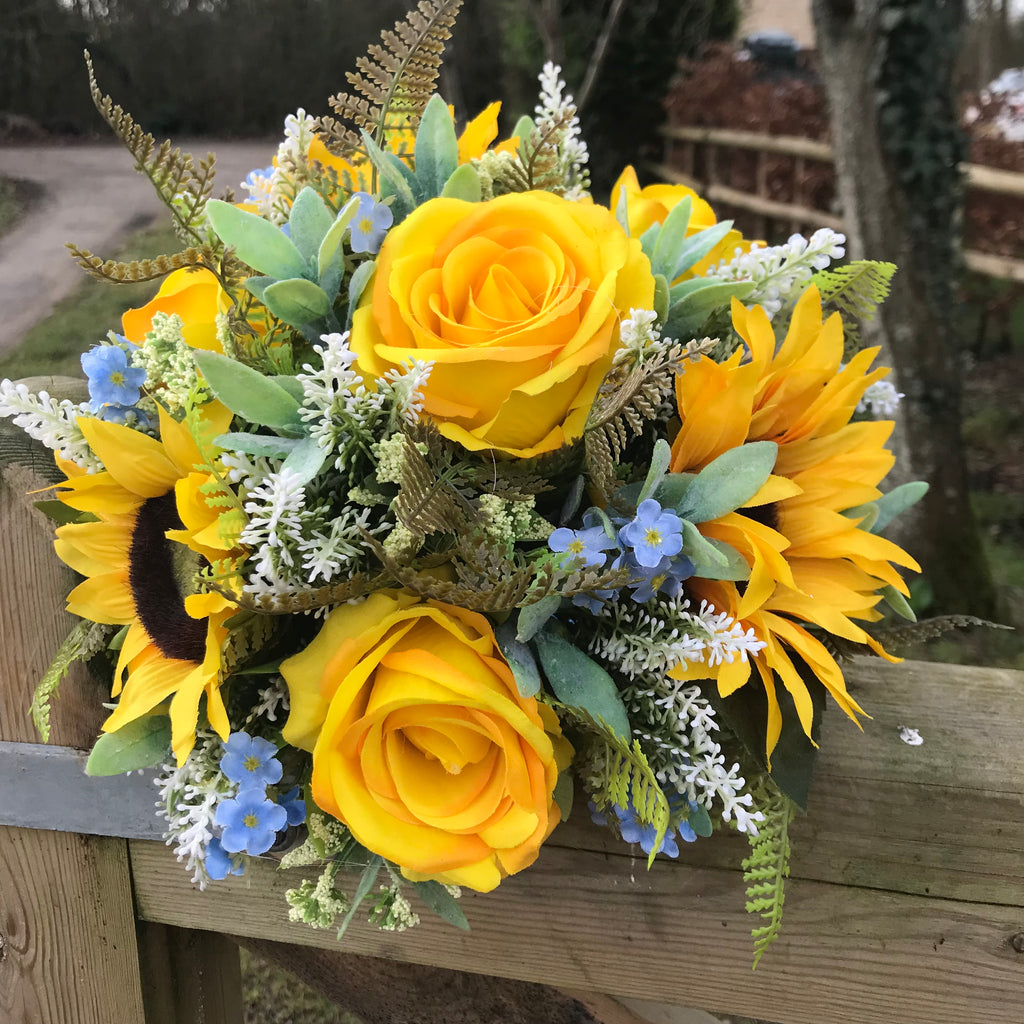 A Brides Bouquet Of Sunflowers Roses And Blue Forget Me Nots Abigailrose 7285