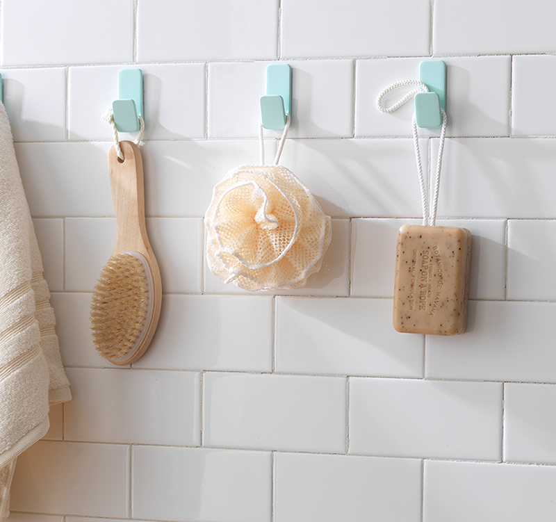How to Get Adhesive Hooks Off the Wall