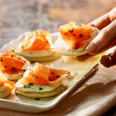 smoked salmon blinis with black truffle mustard