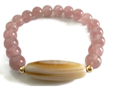 24k gold and dzi bead with strawberry crystal