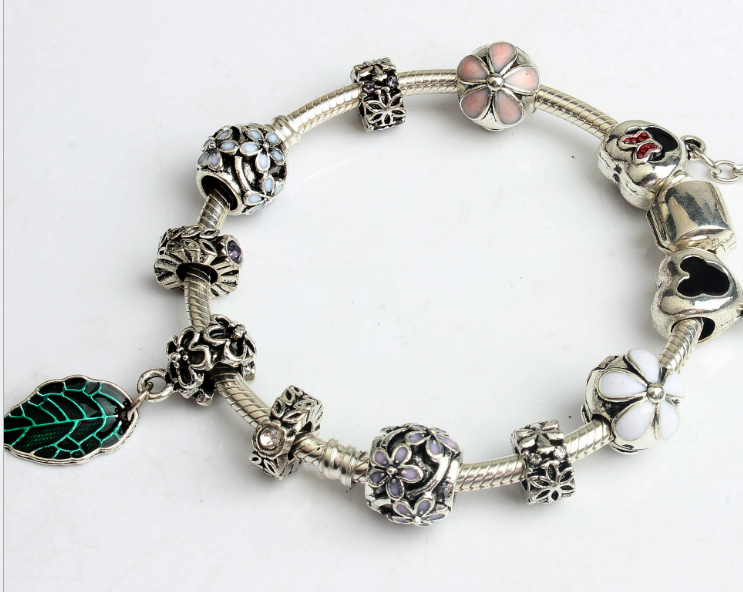 silver charm bracelet & bangle with leaf and flower crystal ball