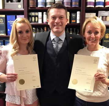 Alison and Toni being awarded their Whisky Ambassador certificates.