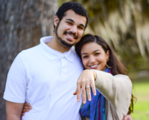 Engaged couple in Gainesville, FL showing off engagement ring