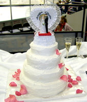 Sports fan wedding cake toppers hockey stick puck NHL fun FunWeddingThings.com