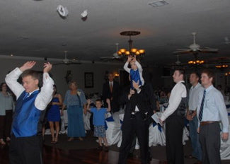 Wedding garter toss FunWeddingThings.com bridal garters throw keep fun humorous unique