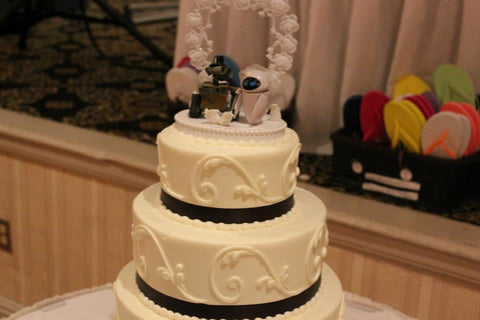 Wall-e Eve wedding cake topper FunWeddingThings.com movie themed top
