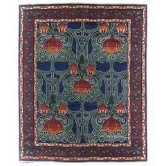 Blue and red hand knotted rug