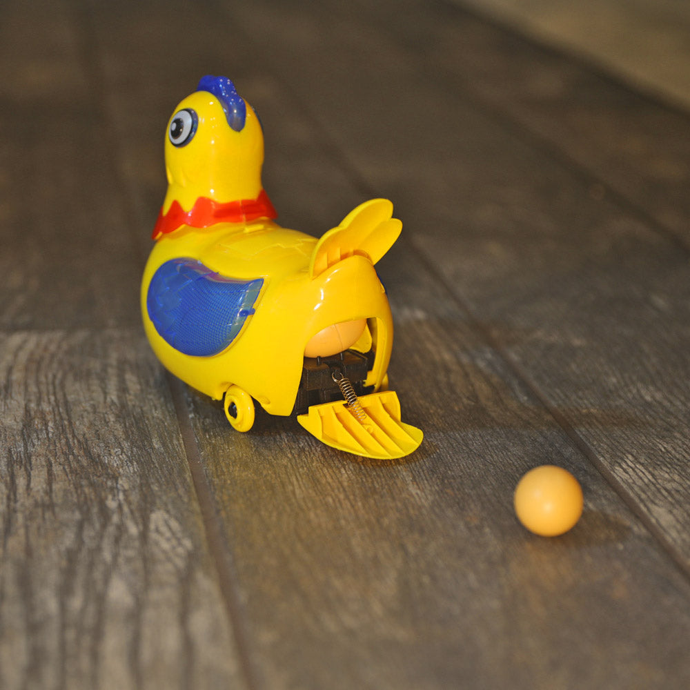 chicken laying an egg toy