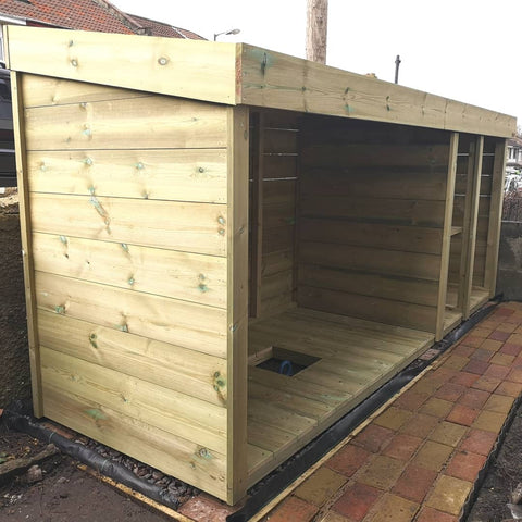 Bike, bin and recycling storage shelter with living green roof planting area for succulents and alpine plants 