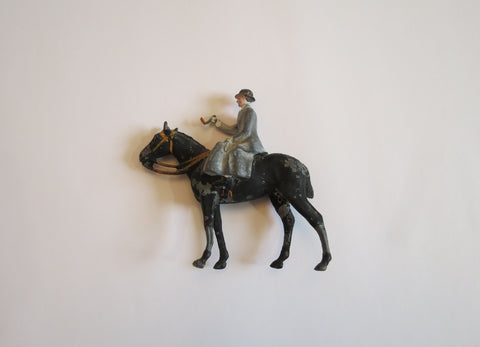 lead lady on a horse antique toys