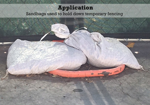 Application: poly sandbags used to hold down temporary fencing