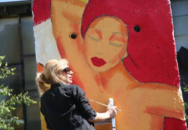 Bilderserie vom Kunstprojekt "Berliner Mauer: Feuer-Wasser"
