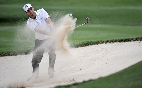 Plume of sand pushing ball toward target.