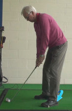 Seniors should adjust their golf swing stance to have the front foot 45 degrees out