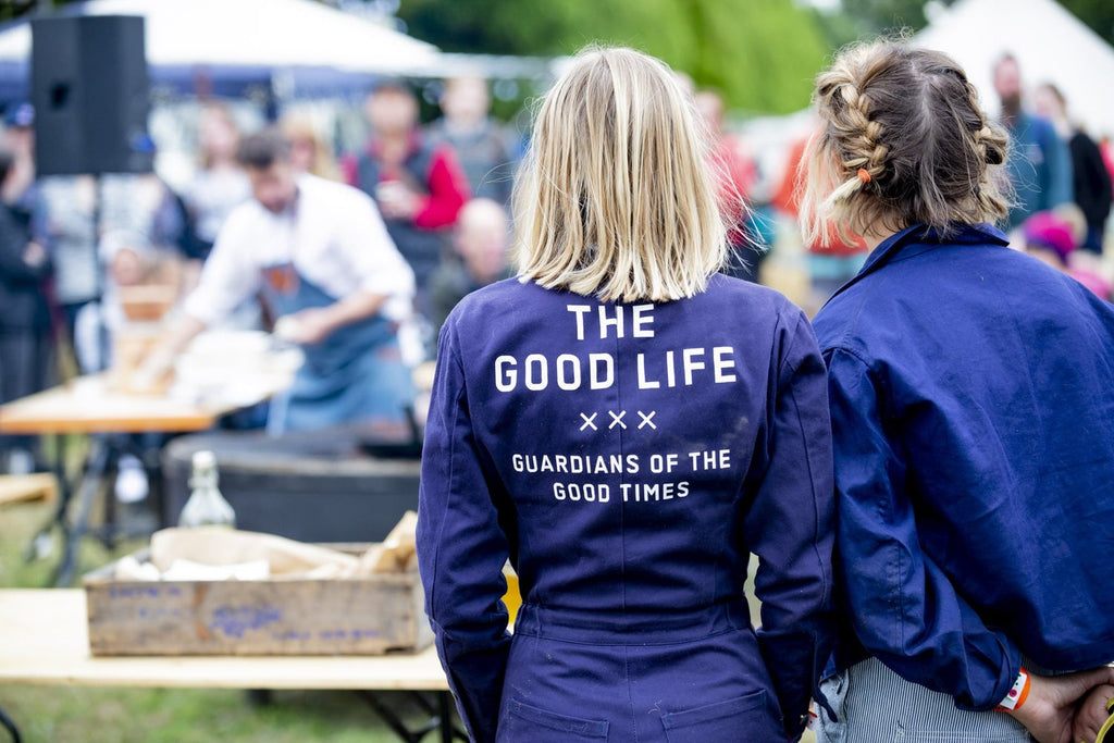 Two women watching a cooking display at The Goodlife Experience 
