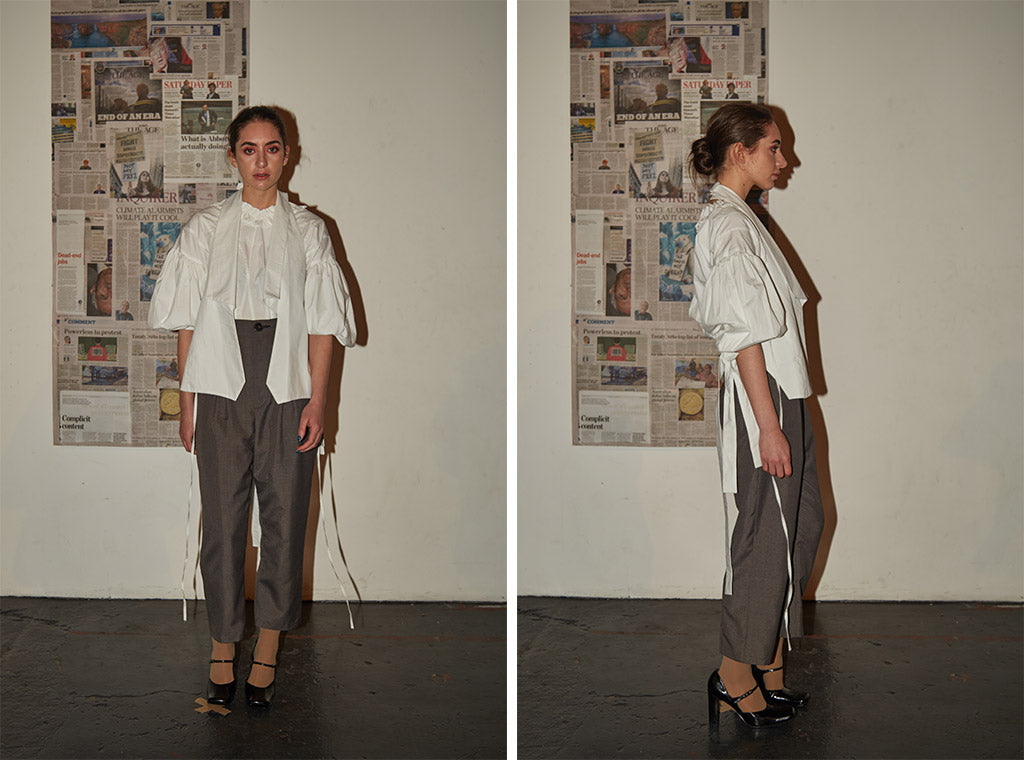 Tailored trousers and white cotton top and waistcoat