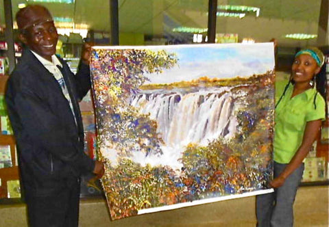 Gathinja Yamokoski with Kenyan Artist, Martin Bulinya, and his painting, Waterfall.