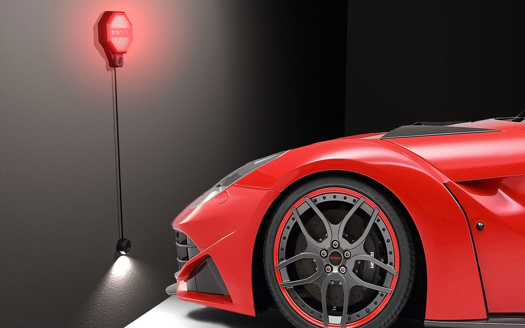 STKR Concepts Garage Parking Sensor with Walkway Lighting graphic showing a red sports car pulled almost right up to a wall with the sensor installed.