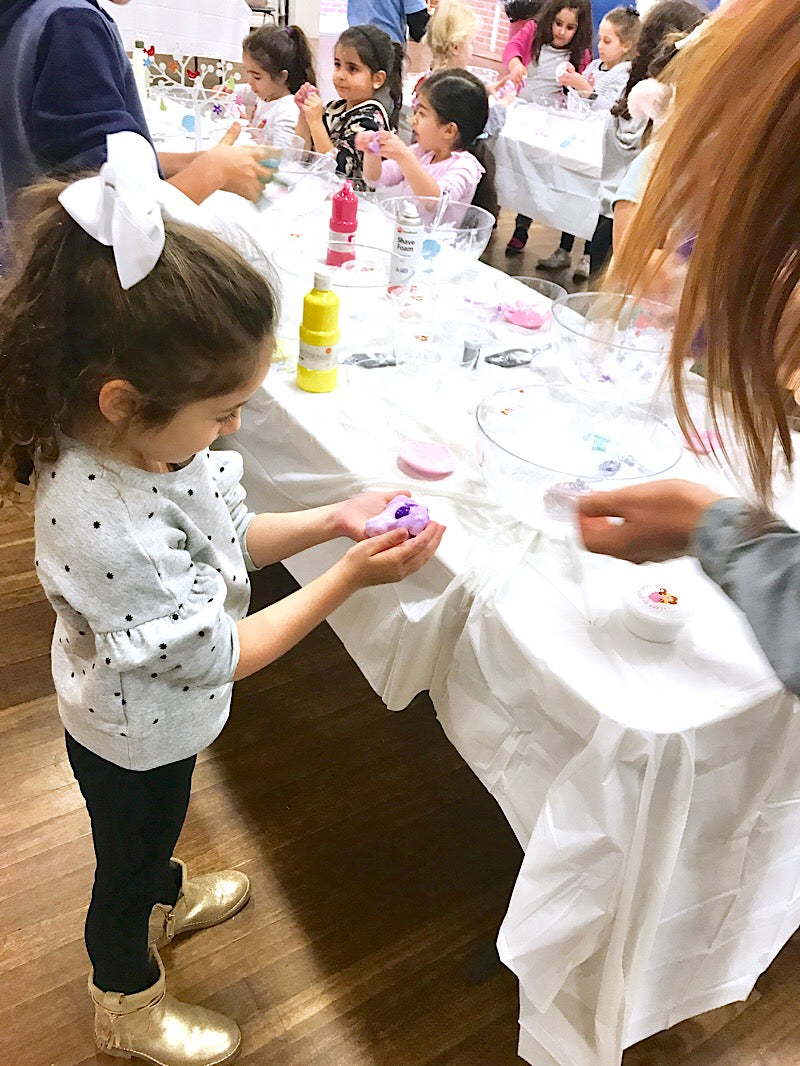 Slime making workshop: one of our slimers focused and engaged during their slime experience 