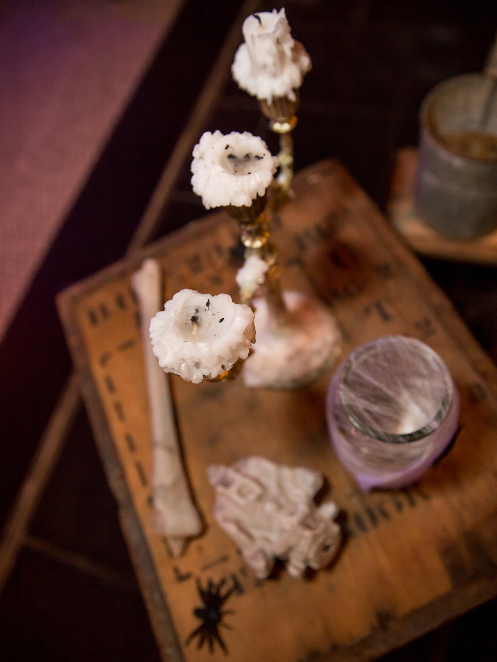 Halloween Decorations: Silver antique candelabra with melted candlewick 