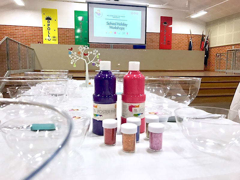 Slime making workshop: set up with paint and glitter slime ingredients