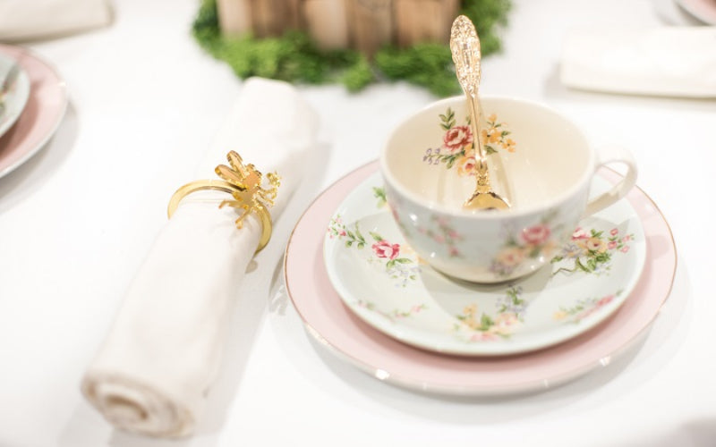 Fairy Party close up of floral crockery with Fairy napkin ring