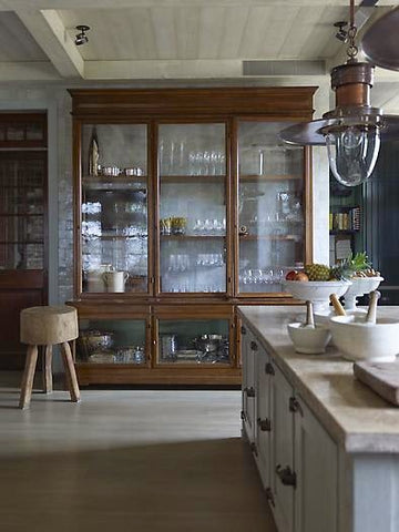 antique inspired glass door cabinet