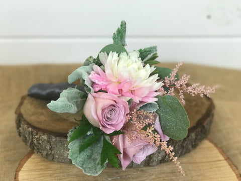 Mother of Bride bouquet done by gig Morris florist in Belmar, Nj at crystal point in pt. pleasant nj. flowers are dahlias, roses and astilbe in blush tones.