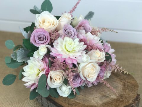 Bridal Bouquet done by gig Morris florist in Belmar, New Jersey at Crystal Point in Pt. Pleasant, NJ with dahlias, roses in a pink, blush and cream color palette