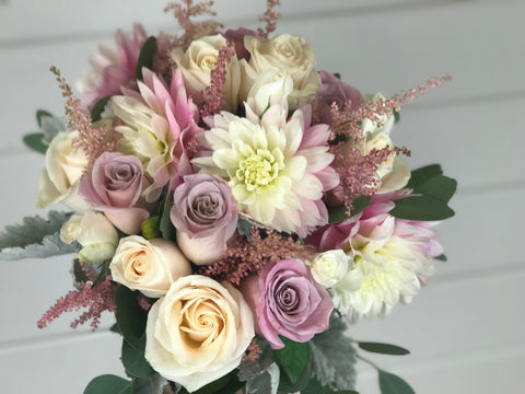 Bridal Bouquet done by gig Morris florist in Belmar, New Jersey at Crystal Point in Pt. Pleasant, NJ with dahlias, roses in a pink, blush and cream color palette