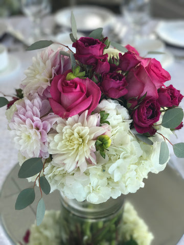 Floral Centerpieces done by gig Morris florist, nj at crystal point in pt. pleasant, nj with hydrangea, roses, spray roses, and dahlias in pinks and creams