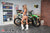 Risk Racing Moto Model Rachel Strait posing in various bikinis and Risk Racing Jerseys next to a dirt bike that's sitting on a Risk Racing ATS stand - Pose #15