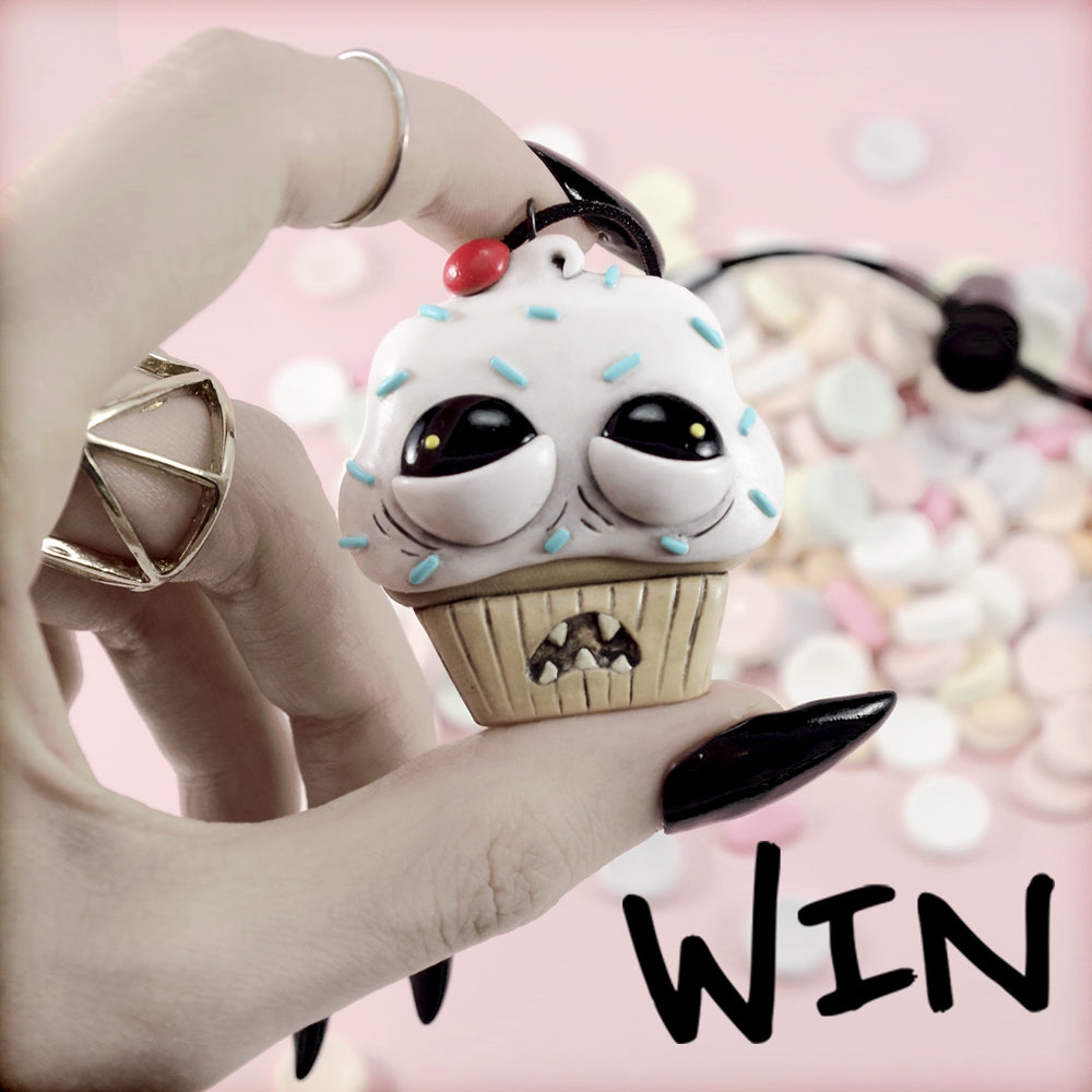 Win the ugly cupcake necklace