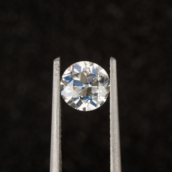 Old European Cut Diamond in Tweezers - Top View