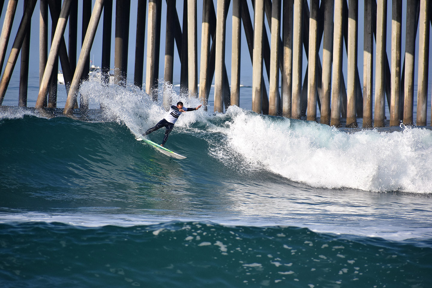 Brett Jordan surfing off Huntington Pier