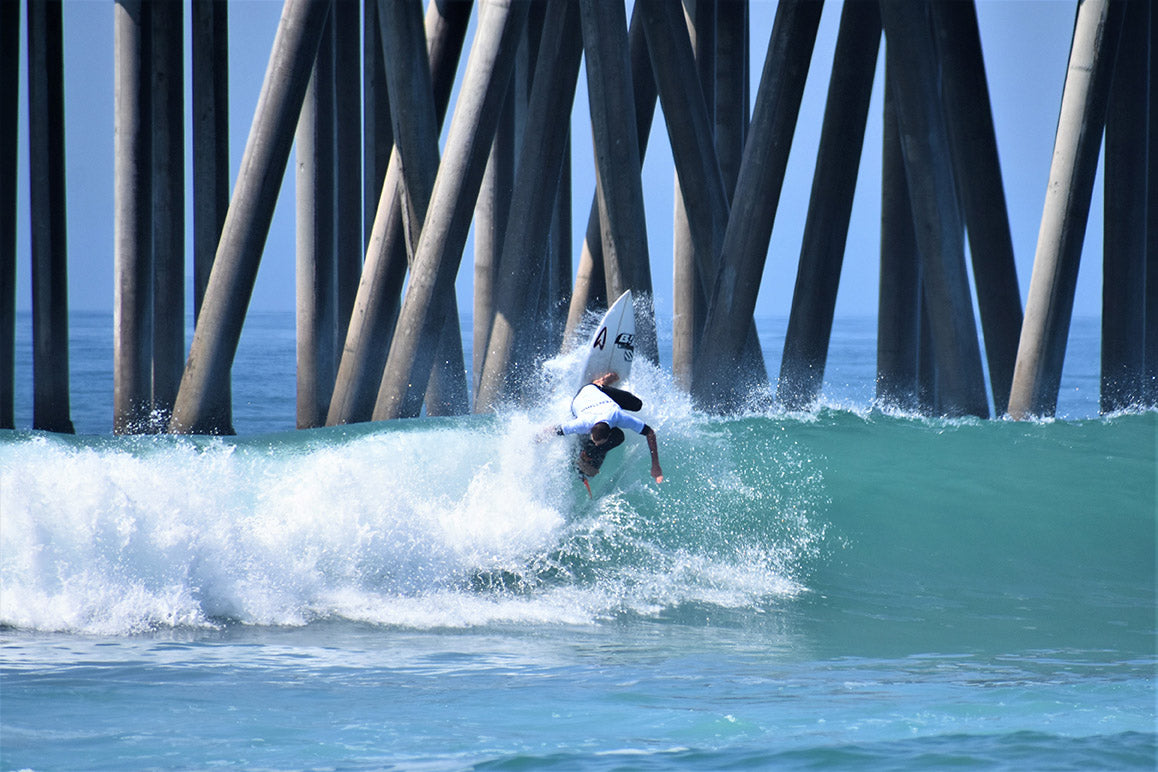 mike mccabe going vertical at huntington beach pier