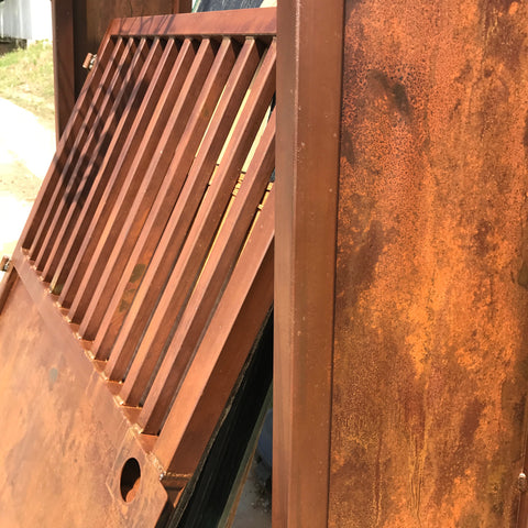 blunt steel security gate metal art patina